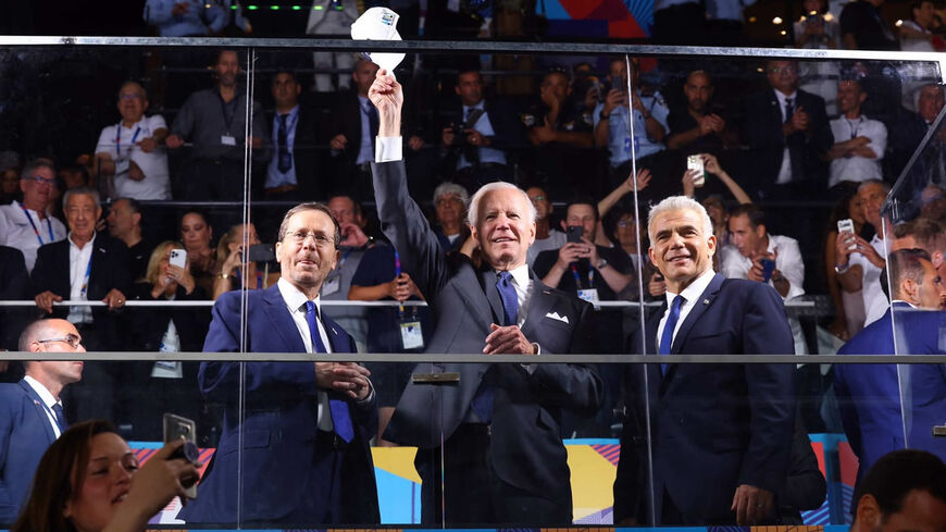 Israeli President Isaac Herzog, US President Joe Biden and Israeli Prime Minister Yair Lapid at the opening of the Maccabiah Games, Teddy Stadium, Jerusalem, July 14, 2022.