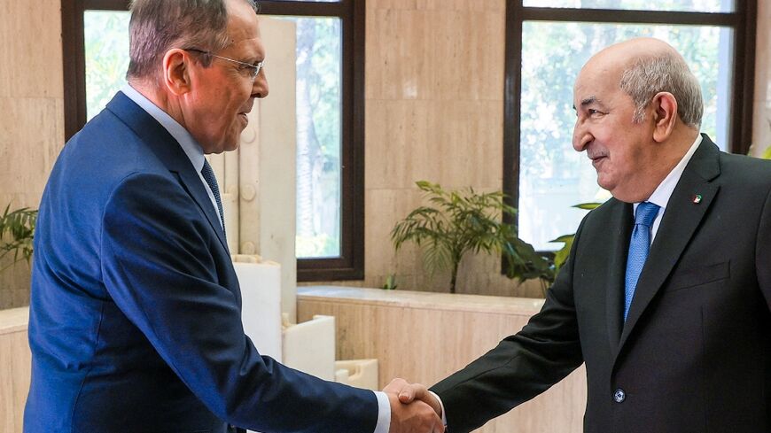 Russian Foreign Minister Sergei Lavrov (L) met Algeria's President Abdelmadjid Tebboune in Algiers on May 10, 2022