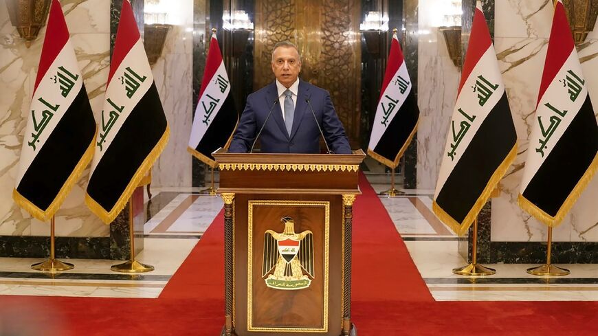 Iraq's Prime Minister Mustafa al-Kadhemi speaks during the national dialogue meeting in the capital Baghdad on August 17, 2022