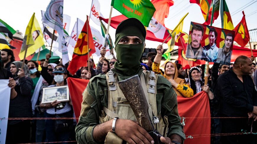 Syrian Kurds demonstrate on June 10, 2021, in the northeastern Syrian city of Qamishli.