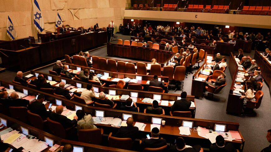 This picture shows a general view of the Israeli Knesset during a meeting, in Jerusalem on June 30, 2022. 