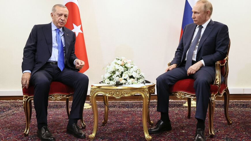 Russian President Vladimir Putin meets with Turkey's President Recep Tayyip Erdogan in Tehran on July 19, 2022.
