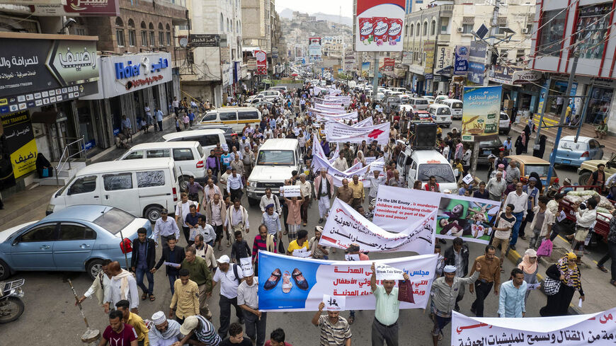 Yemeni demonstrators protest demanding the end of a yearslong blockade of the area imposed by the Houthi rebels on the country's third-largest city of Taez, Yemen, July 26, 2022.