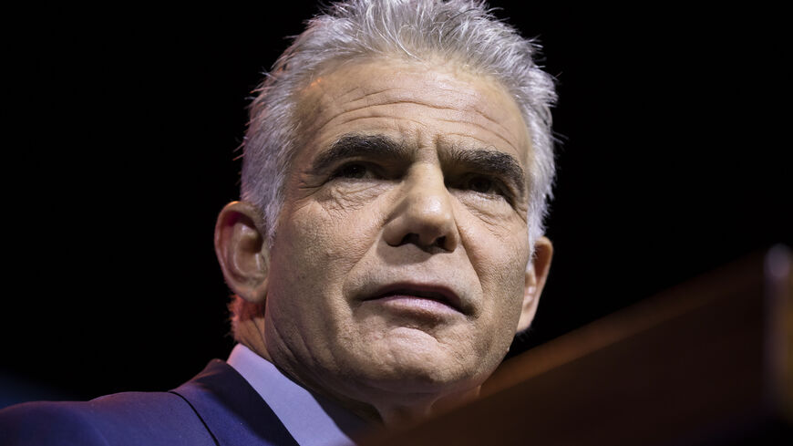 Israeli Prime Minister and Yesh Atid party leader Yair Lapid speaks during the party's opening election campaign rally ahead of the general elections, Tel Aviv, Israel, Aug. 3, 2022.