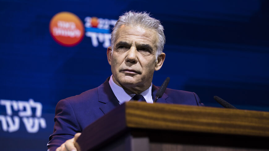 Israeli Prime Minister and Yesh Atid party leader Yair Lapid speaks during the party's opening election campaign rally ahead of Israel's general elections, Tel Aviv, Israel, Aug. 3, 2022.