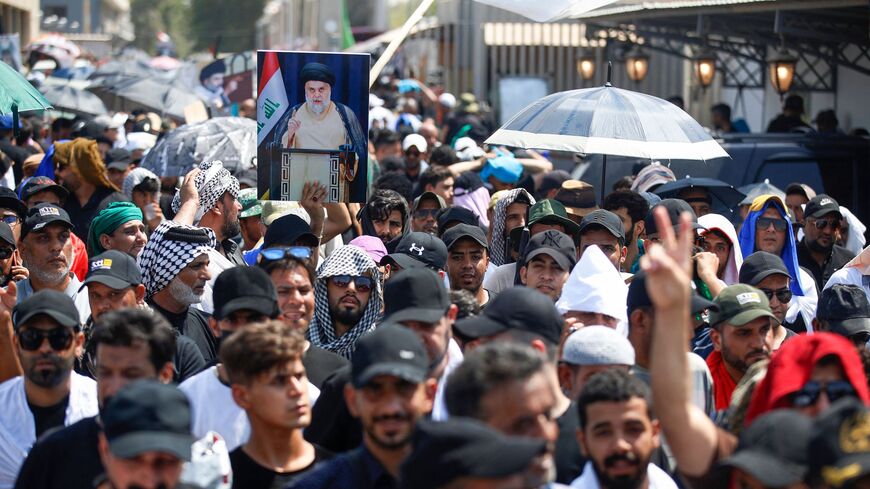 Supporters of Shiite cleric Muqtada al-Sadr gather outside the Iraqi parliament in the Green Zone in the capital Baghdad, on the seventh day of protests against the nomination of a rival Shiite faction for the position of prime minister in the heavily-guarded Green Zone, on Aug. 5, 2022. 