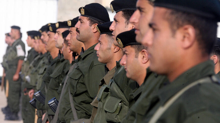 Members of the Palestinian security services stand at attention during a drill in the flashpoint West Bank city of Nablus.