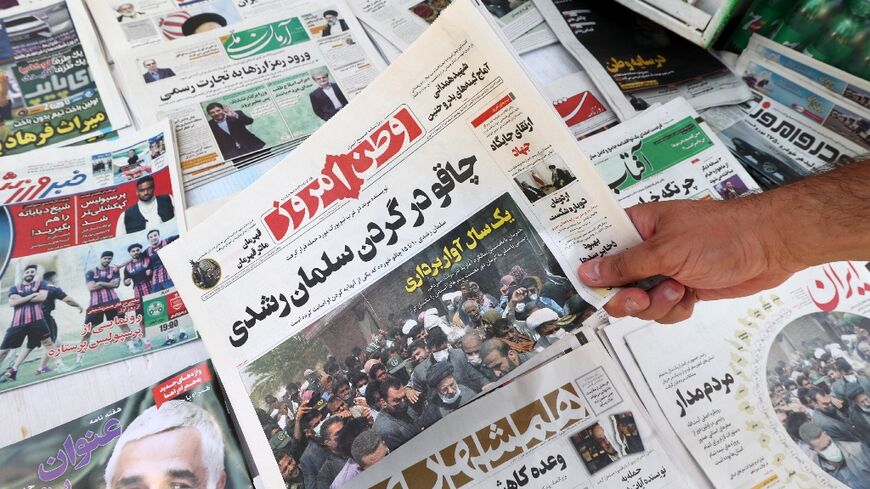 'Knife in the neck of Salman Rushdie,' says the front-page headline in Vatan-e Emrooz newspaper, which like most of Iran's press hailed Friday's attack in the United States on the 'apostate' British author of 'The Satanic Verses'