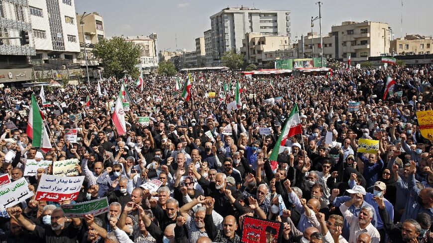 Thousands of people marched through Iran's capital during a pro-government counter-rally Friday