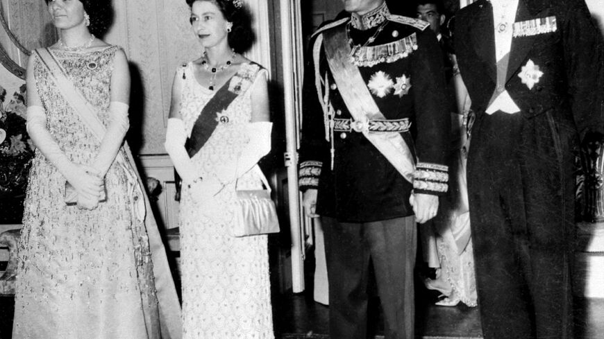 In this file photo taken on March 2, 1961, Britain's Queen Elizabeth II (2nd L) and Prince Philip (R) pose with Iran's Shah Mohammad Reza Pahlavi (2nd R) and his wife Farah Pahlavi during their state visit to Tehran