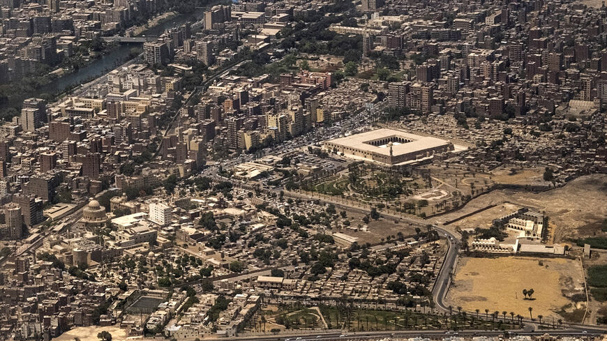 Aerial view of the historic old Cairo district, showing the Mosque of Amr ibn al-Aas and the complex of religious built atop the fortress that includes the Church of St George, the Coptic Orthodox Church of St Mary and Ben Ezra Jewish Synagogue, May 14, 2021.
