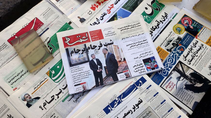 Newspaper stall with a view of Etemad newspaper's front page bearing a title reading in Farsi "The night of the end of the JCPOA,"