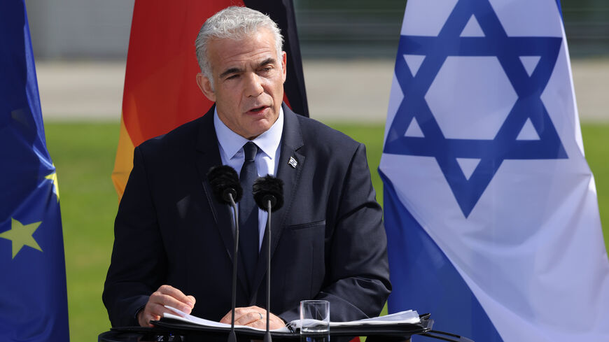 Interim Israeli Prime Minister Yair Lapid and German Chancellor Olaf Scholz (not pictured) speak to the media following talks at the Chancellery, Berlin, Germany, Sept. 12, 2022.