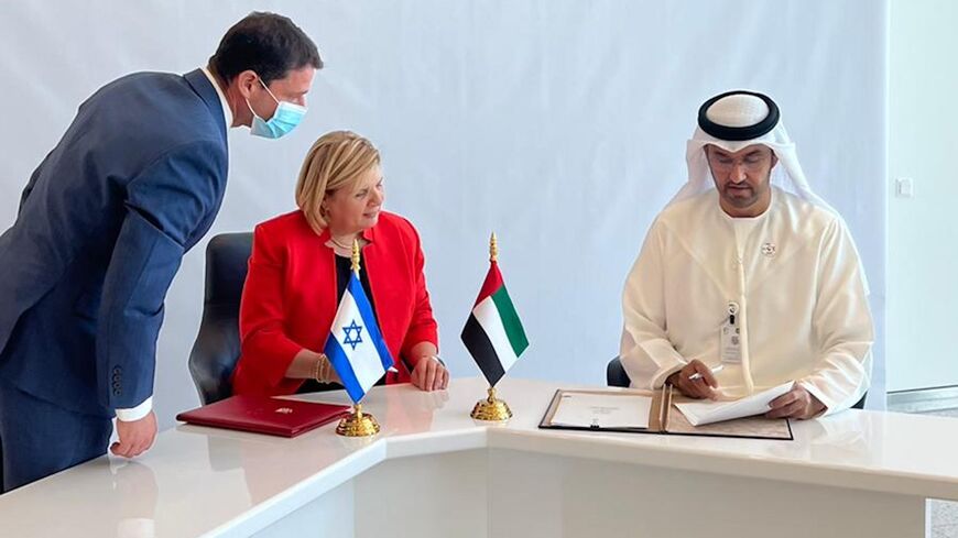 Israeli Economy and Trade Minister Orna Barbivai signing an MOU for cooperation on trade and production with Emirati counterparts, Dubai, June 1, 2021.