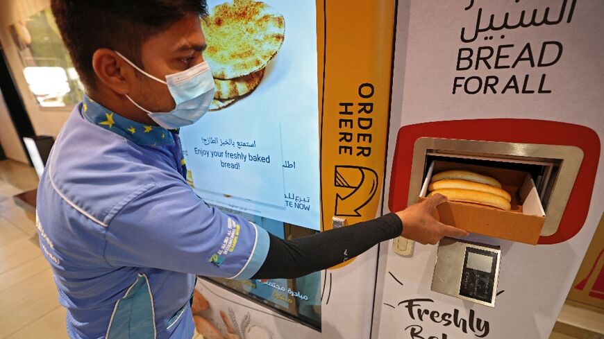 Ten vending machines were installed last week in supermarkets, with a computer touch screen allowing people to select different types: loaves for sandwiches, pitta bread or flat Indian-style chapatis