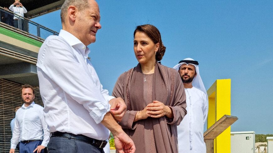 German Chancellor Olaf Scholz, here with UAE Minister of Climate Change Mariam Almheiri touring a mangrove park in Abu Dhabi, is visiting the Gulf to secure energy supplies