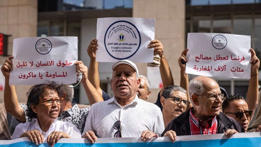 Members of a Moroccan human rights association demonstrate in front of the European Union offices in Rabat against the restriction of visa