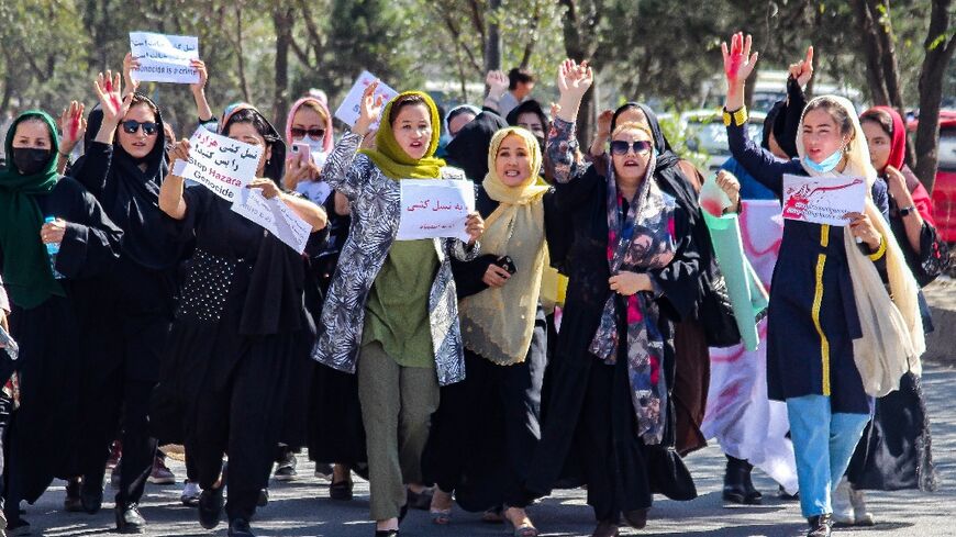 Women from Afghanistan's minority Hazara community protested in Kabul, after a suicide bombing at an education centre left dozens dead