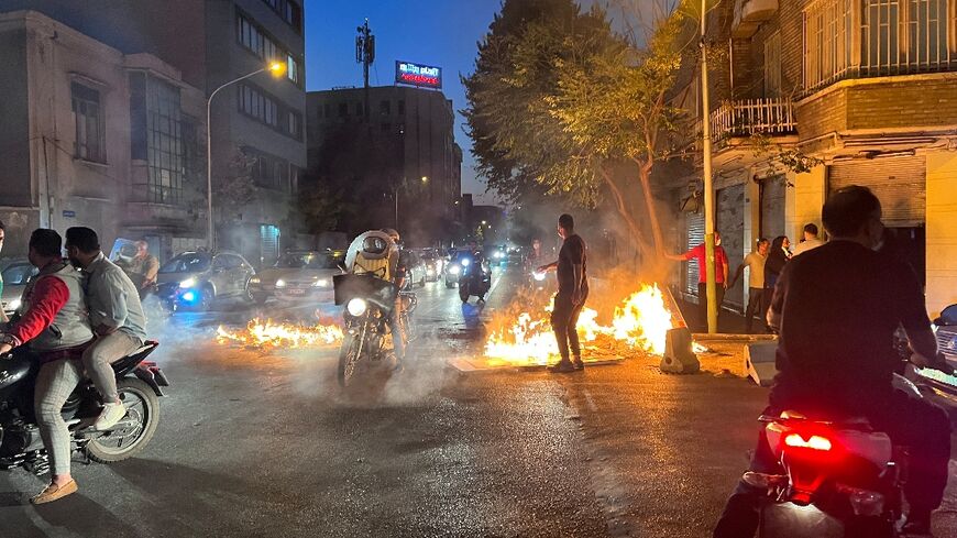 A picture obtained by AFP outside Iran reportedly shows unrest in the capital Tehran on October 8, 2022