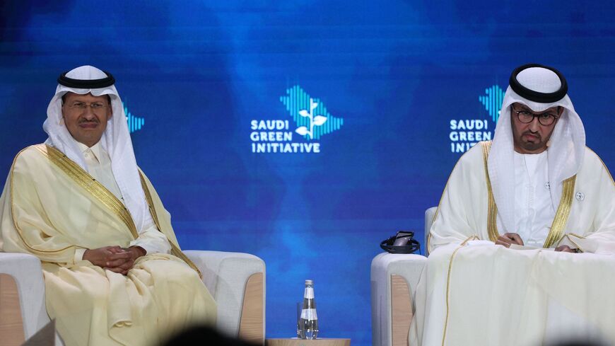 Saudi Energy Minister Abdulaziz bin Salman Al Saud (L) and UAE's Minister of State and special envoy for climate change Sultan Ahmed al-Jaber.