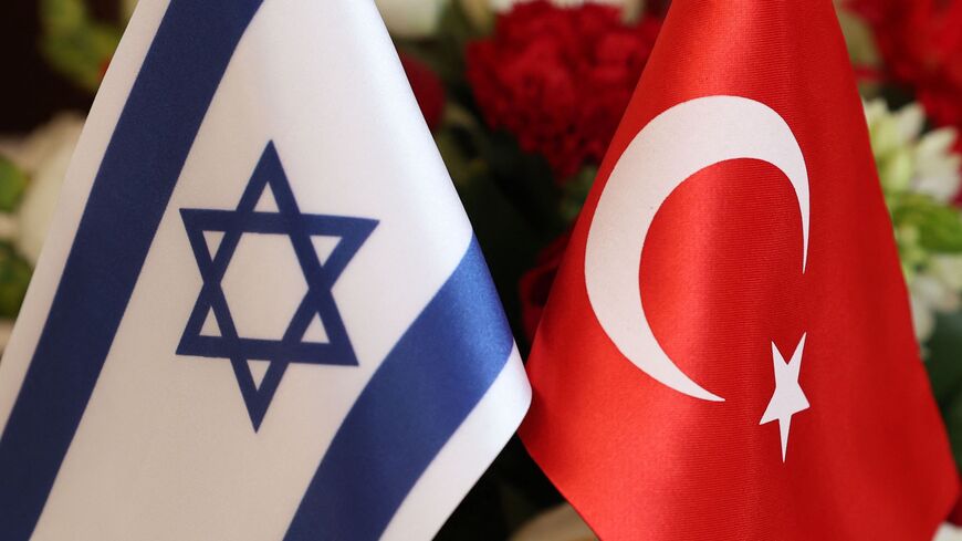 The Turkish (R) and Israeli flags.