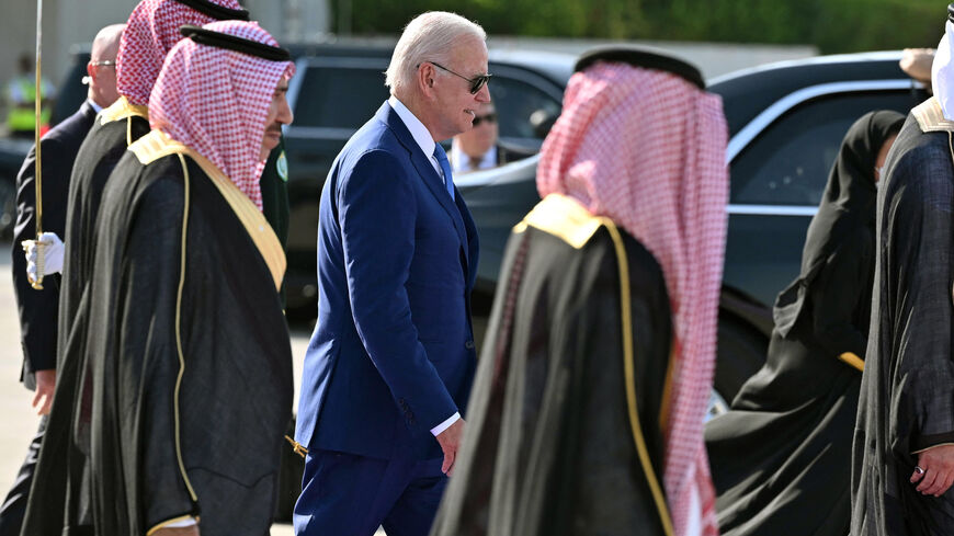 US President Joe Biden boards Air Force One before departing from King Abdulaziz International Airport at the end of his first tour in the Middle East as president, Jeddah, Saudi Arabia, July 16, 2022.