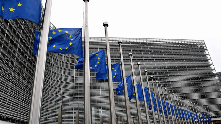 European flags fly at half-mast during a meeting of European Union energy ministers to find solutions to rising energy prices at the EU headquarters, one day after the death of Britain's Queen Elizabeth II, Brussels, Belgium, Sept. 9, 2022.