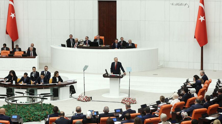 Turkish President Recep Tayyip Erdogan addresses the parliament.