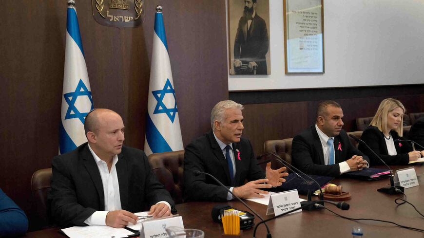 Israeli Prime Minister Yair Lapid makes an opening statement as he chairs the weekly Cabinet meeting, Jerusalem, Oct. 2, 2022.