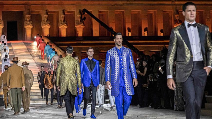 Models present creations by Italy's iconic fashion house Stefano Ricci at the temple of the Ancient Egyptian Pharaoh Hatshepsut.