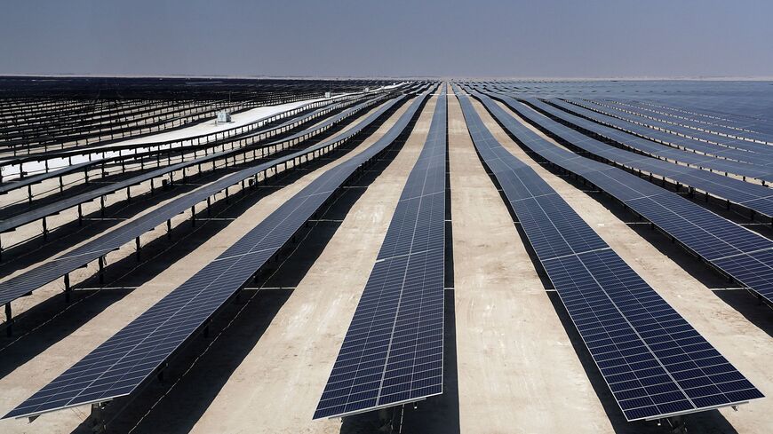 This picture taken on Oct. 18, 2022 shows a view of solar panels at the newly-inaugurated al-Kharsaah solar power plant in Qatar. 