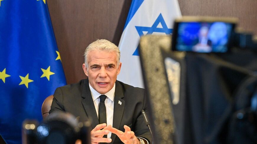 In EU dialogue, Lapid recommits Israel to two-state solution