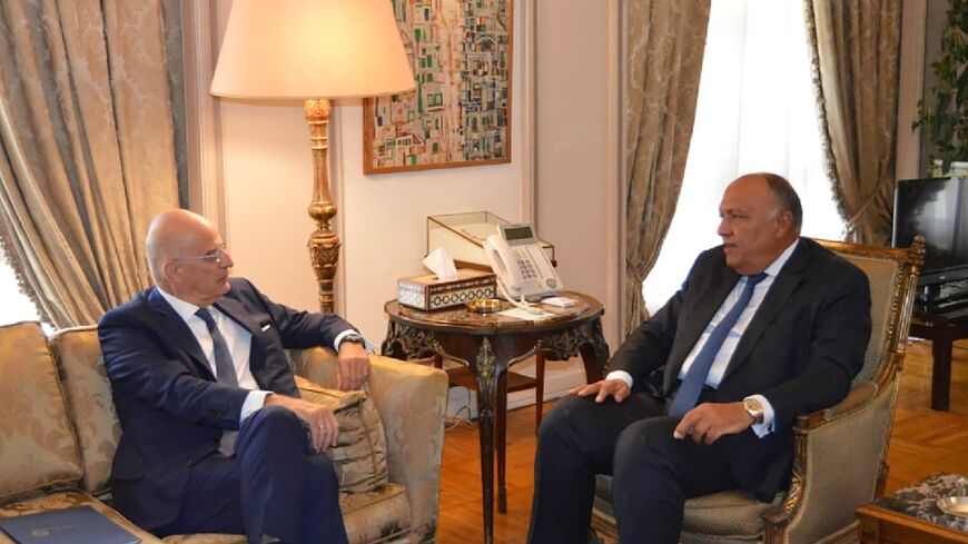 Egyptian Foreign Minister Sameh Shoukry (R) met with his Greek counterpart Nikos Dendias in Cairo on Sunday, discussing events in neighbouring Libya