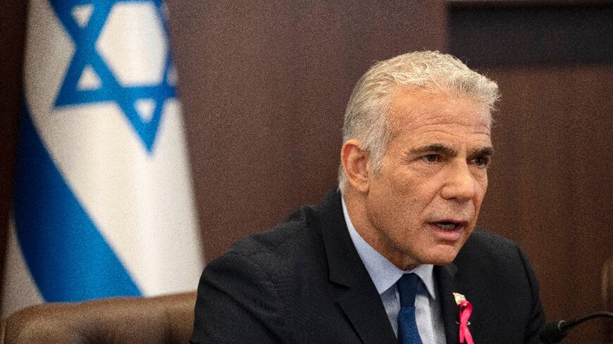 Israeli Prime Minister Yair Lapid opens his weekly cabinet meeting in Jerusalem on Sunday