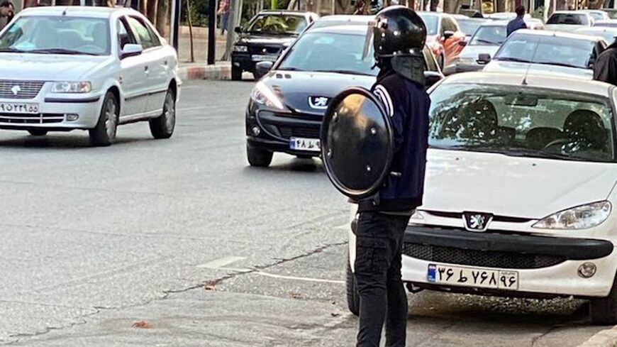 There are reports from different cities of Iran that the government of the Islamic Republic uses children under the age of 18 as repression forces. This child in Shahrood is wearing a military uniform and holding a baton