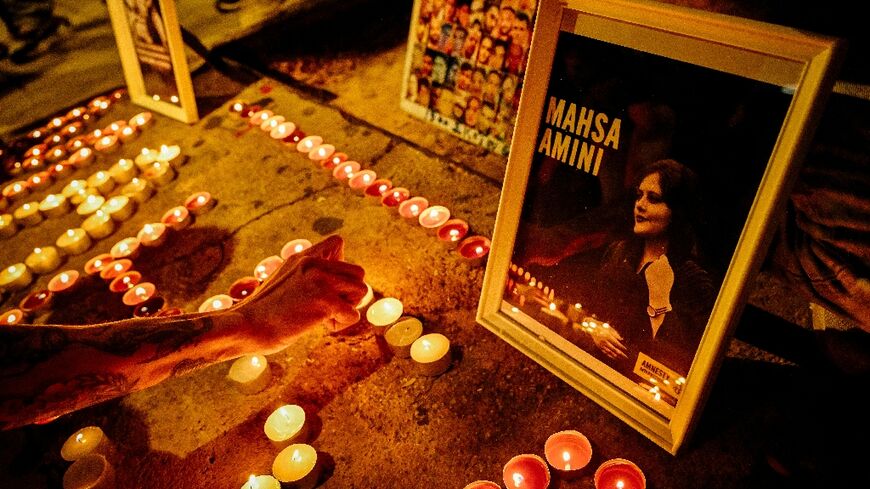Iranians in Greece lit candles in Athens on Saturday to commemorate 40 days since the death of Mahsa Amini