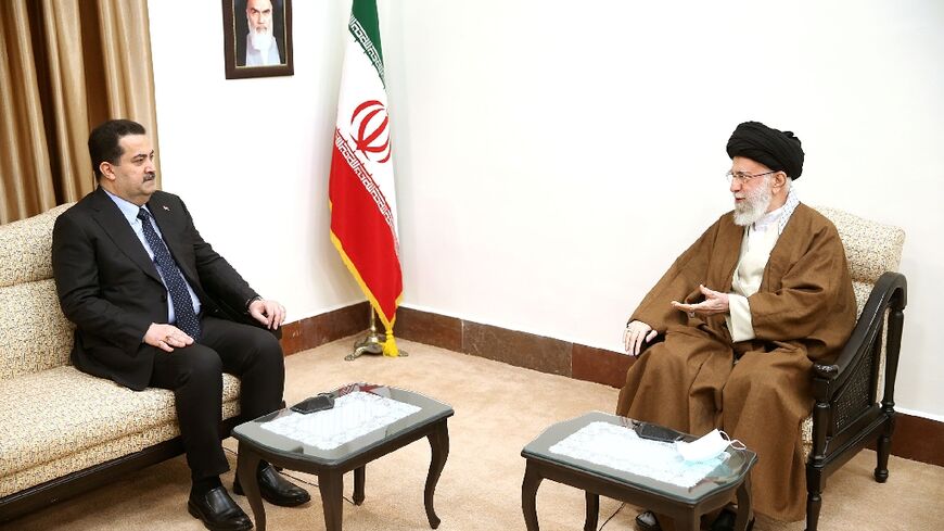 Iran's Supreme Leader Ayatollah Ali Khamenei (R) has told Iraq's new Prime  Minister Mohammed Shia al-Sudani that Baghdad should do more to secure the common border between the two countries