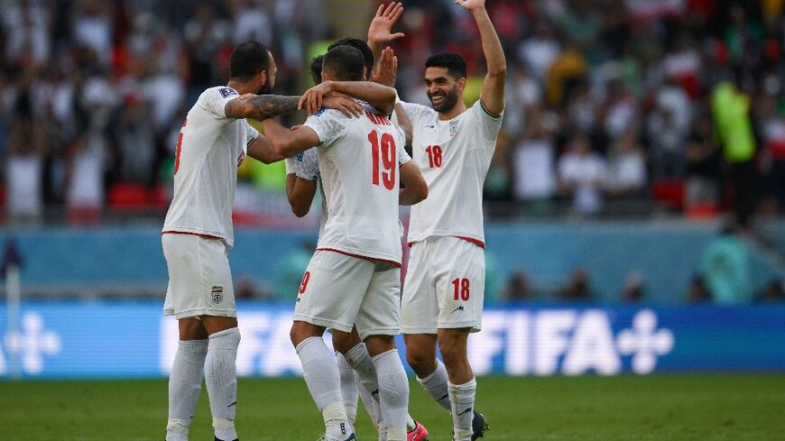 Iran celebrate their World Cup win against Wales