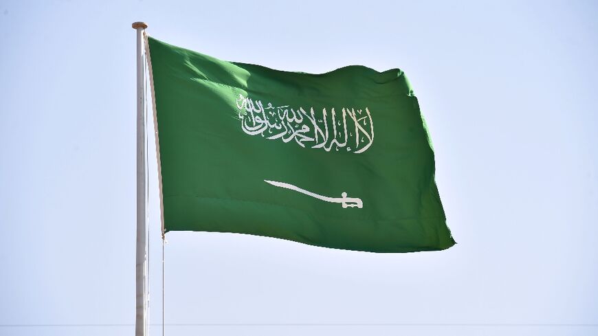 The Saudi national flag pictured flying in the capital