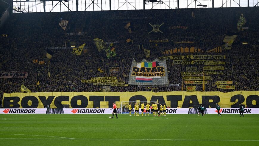 Dortmund fans display banners demanding a boycott of the World Cup in Qatar during the Bundesliga football between Borussia Dortmund and Bochum
