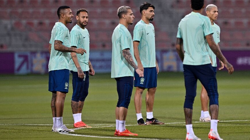 Neymar (2nd L) with his Brazil teammates at training in Doha on Wednesday