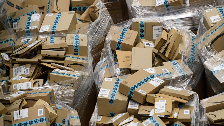 Completed customer orders are seen in their boxes, awaiting delivery, at the Amazon Fulfillment Center.