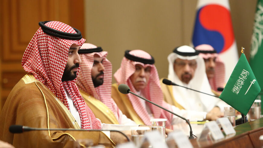 Saudi Crown Prince Mohammed bin Salman (L) speaks with South Korean President Moon Jae-In (not pictured) during a meeting at the Presidential Blue House, Seoul, South Korea, June 26, 2019.