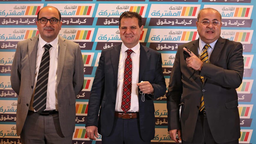 (L to R) Sami Abu Shehadeh, Ayman Odeh and Ahmed Tibi pose for a group picture during a presser to announce the launch of the Arab Joint List alliance campaign, Nazareth, Israel, Feb. 20, 2021.