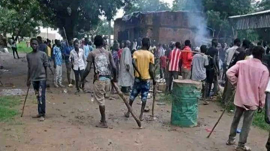 Sudanese gather amid renewed ethnic clashes in al-Roseires, despite a cease-fire agreement between rival groups following deadly violence weeks ago, Blue Nile state, Sudan, Sept. 2, 2022.