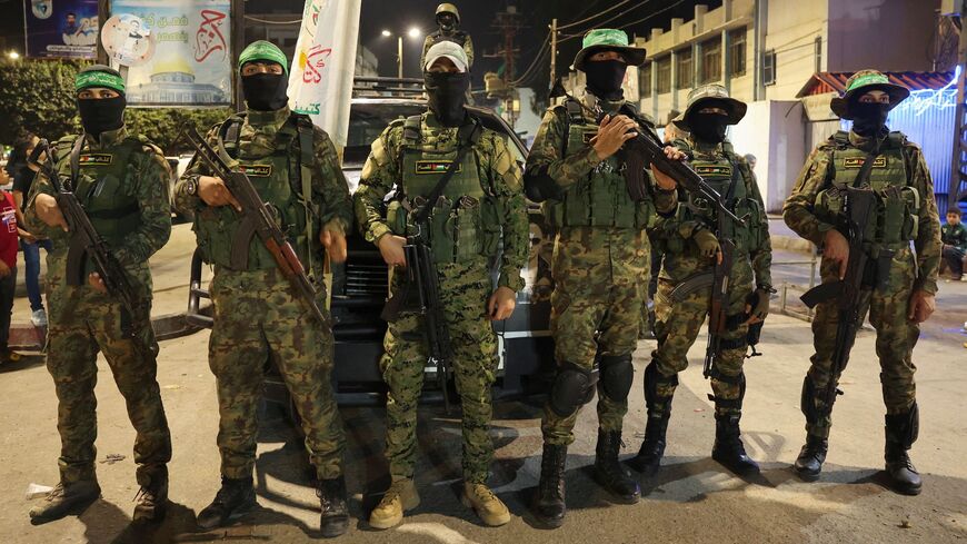 Members of the Palestinian Ezzedine al-Qassam Brigades take part in a demonstration by supporters of the Hamas movement.