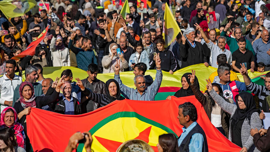 Syrian Kurds protest against Turkey and in solidarity with the Kurdistan Workers Party, in the Kurdish-held city of Qamishli, Syria, Nov. 13, 2022.