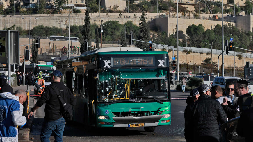 Israeli security forces gather at the scene of an explosion at a bus stop in Jerusalem, Nov. 23, 2022.