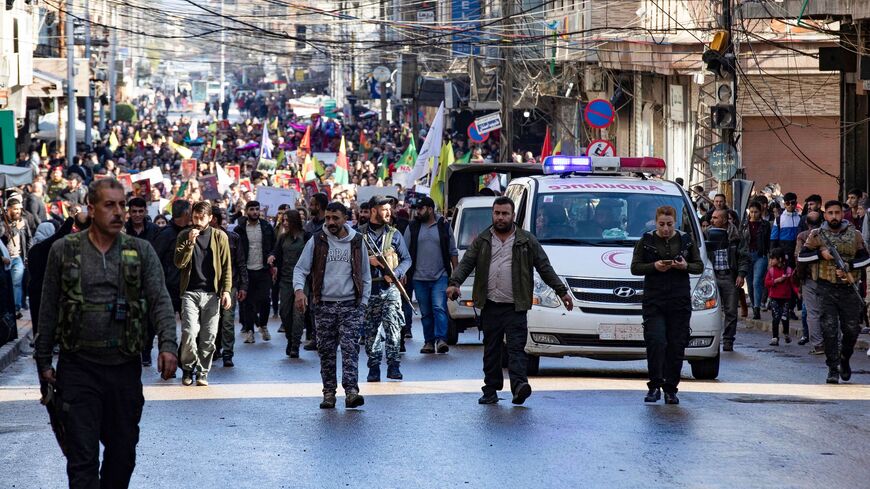 Syrian-Kurdish demonstrators take to the streets to protest against Turkey.