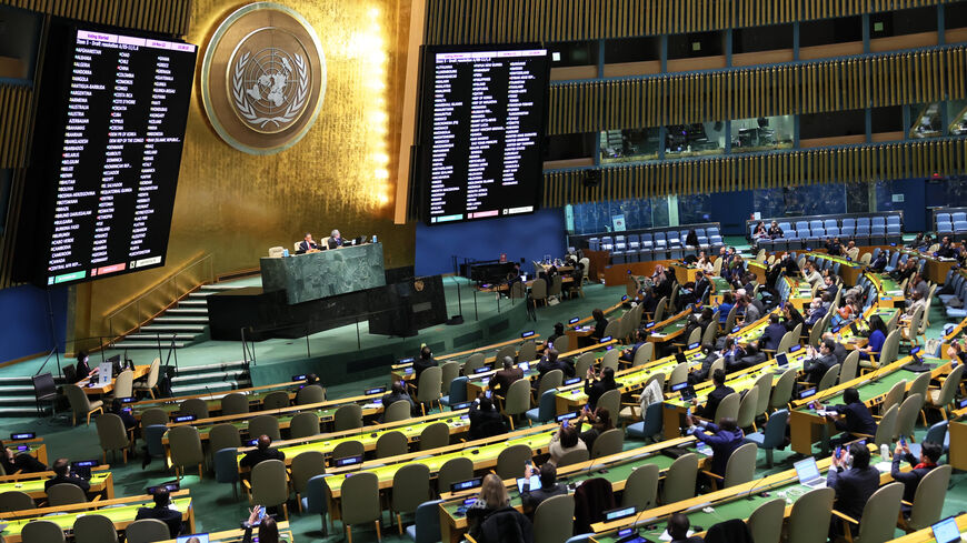 Members of the United Nations General Assembly vote on a draft resolution during a special session in the General Assembly Hall, UN headquarters, New York, Nov. 14, 2022.